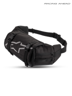 Alpinestars Tech Tool Pack, Enduro waist bag, black and white, featuring durable 600D polyfabric construction, compression straps, and front logo detail, studio product shot for off-road riding