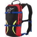 Alpinestars Iguana Hydratatierugzak, off-road motorcross rugzak, zwart en rood met blauwe riemen en fluorgele graphics, wit Astars-logo, twee compartimenten met ritssluiting, gewatteerde schouderbanden met zichtbare drinkslang