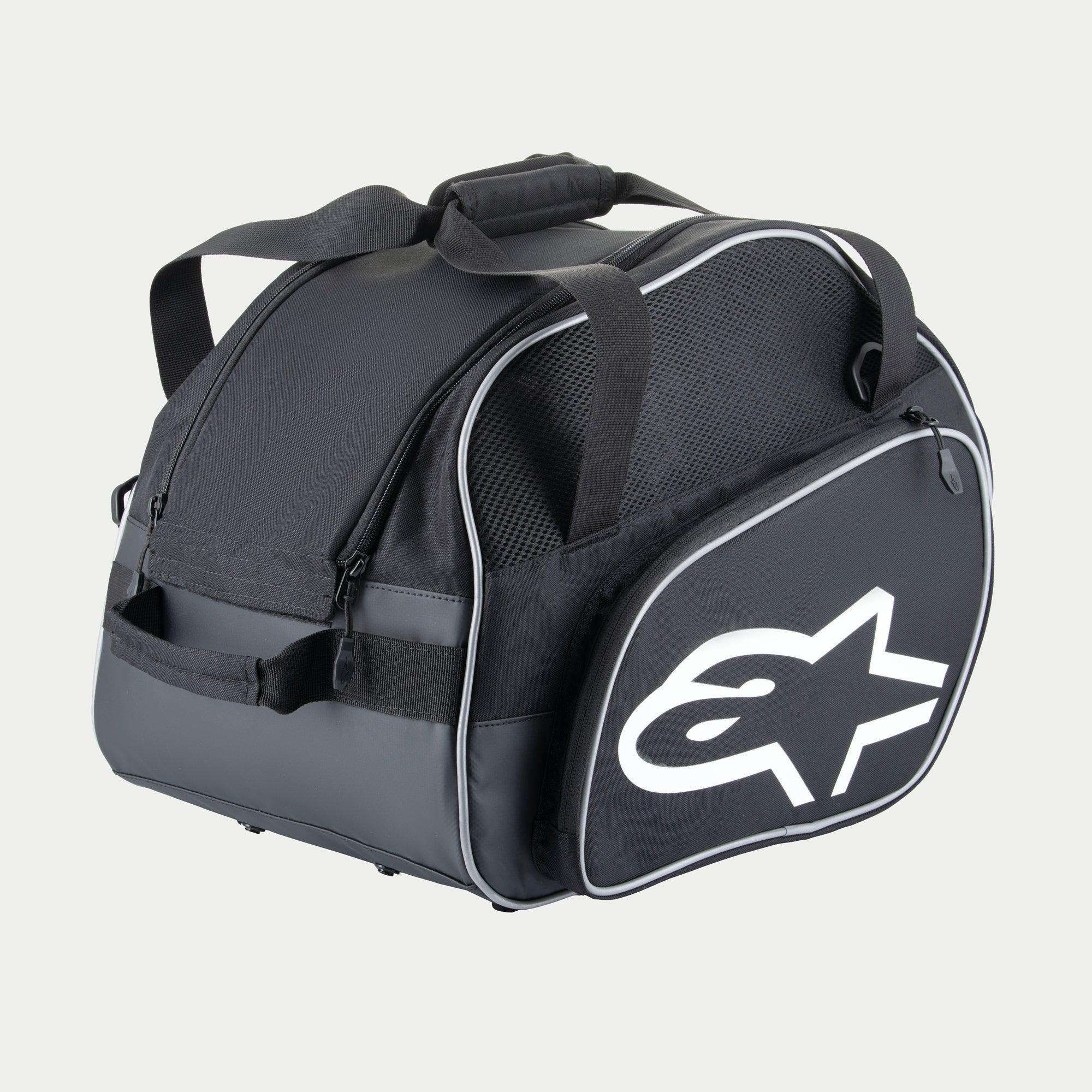 Alpinestars Flow V3 helm tas, beschermende opbergtas voor integraalhelmen, zwart en wit, met een groot wit logo op de zijkant, mesh ventilatiepanelen en verstevigde handgrepen, duurzaam polyester ontwerp voor race-uitrusting