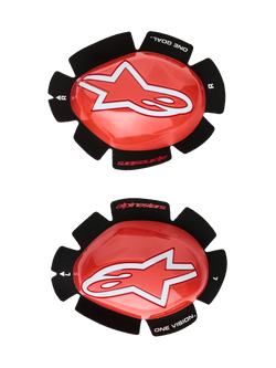 Alpinestars GP Tech Knee Sliders, Red and White, Motorcycle Racing Knee Protectors, featuring a large white star logo on glossy red plastic, 'ONE GOAL. ONE VISION.' text on black petal-shaped velcro backing, left and right pair for track use.
