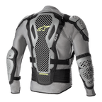 Alpinestars Bionic Action V2 Protection Jacket, achteraanzicht, grijs en zwart met fluogele accenten, voorzien van sterk geperforeerde Cell Technology rug-, schouder- en elleboogbeschermers, grijs mesh-chassis met zwarte verstelbare banden en gele Astars-branding