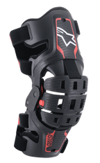 Alpinestars Youth Bionic 5S kniebrace, motorcross kniebeschermer, zwart en rood, voorzien van een wit sterlogo, vierpuntscharnier, robuust composietframe met verstelbare banden, ontworpen voor jeugd off-road racing