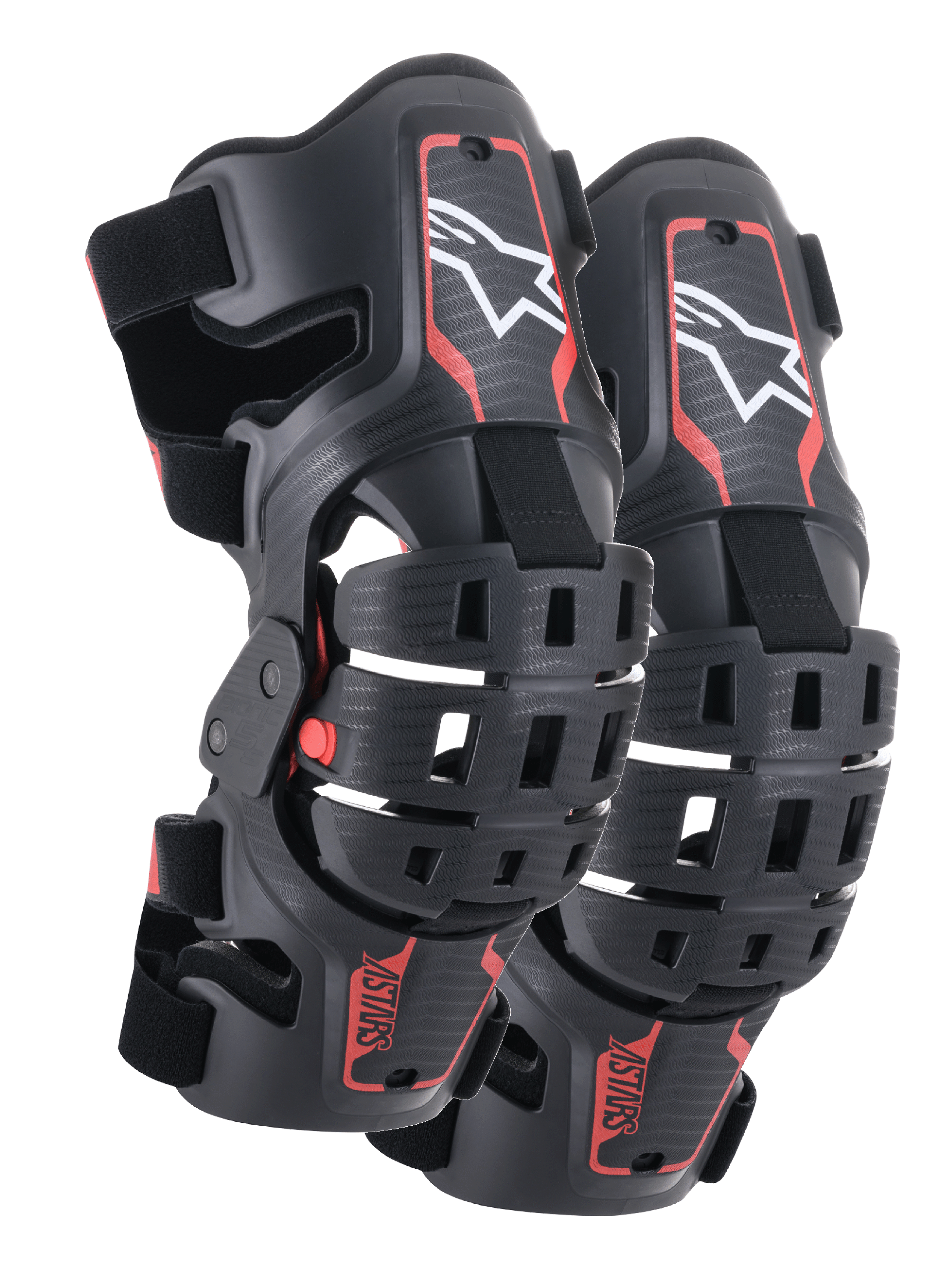 Alpinestars Bionic 5S Youth kniebraces, motorcross kniebescherming, zwart en rood, paar beschermers met een hybride frame-ontwerp en geventileerde schalen, wit Astar-logo bovenaan, rode ASTARS-branding onderaan en verstelbare zwarte banden voor een stevige pasvorm.