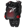 Alpinestars A-1 Pro borstbeschermer, antraciet zwart en rood, geperforeerd ademend ontwerp met wit logo, verstelbare riemen met rode gespen, hexagonaal ventilatiepatroon, lichtgewicht beschermende uitrusting voor motorcross en off-road