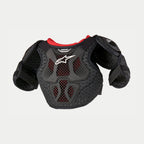 Alpinestars Youth Bionic Action Kickstart borstbeschermer, motorcross borstbescherming, zwart en rood, voorzien van semi-rigide TPR-platen met geventileerd honingraatgaas, wit Alpinestars-logo en beschermende schouder- en bicepsbeschermers.