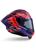Alpinestars Supertech R10 Limited Edition Flyte Helm, Purple Red Glossy, integraal motorhelm met diepblauwe en paarse basis met levendige oranje en rode vlammotieven, aerodynamisch profiel met een rode achterspoiler en donkergetint vizier, professionele race-uitrusting