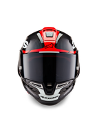 Alpinestars Supertech R10 Element Helm, zwart carbon met felrode en witte glanzende graphics, vooraanzicht met een donker getint vizier, zichtbare koolstofvezelstructuur en geïntegreerde ventilatie, professionele motorhelm van racekwaliteit