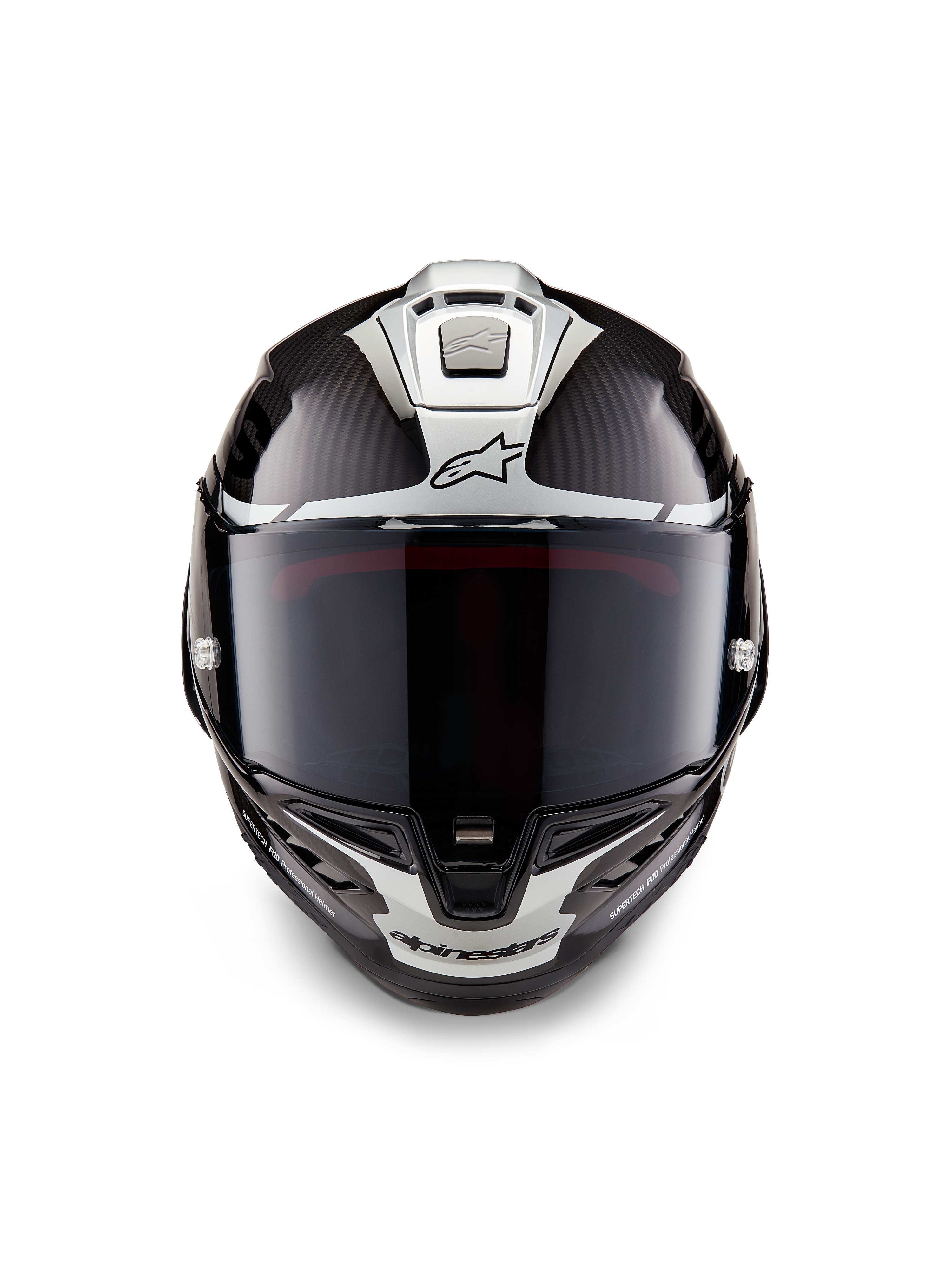 Alpinestars Supertech R10 Element Helmet, Full-Face Racing Helmet, Black Carbon Silver Black Glossy, front view showing dark smoke visor and glossy carbon fiber weave with silver aerodynamic graphics and Alpinestars logos