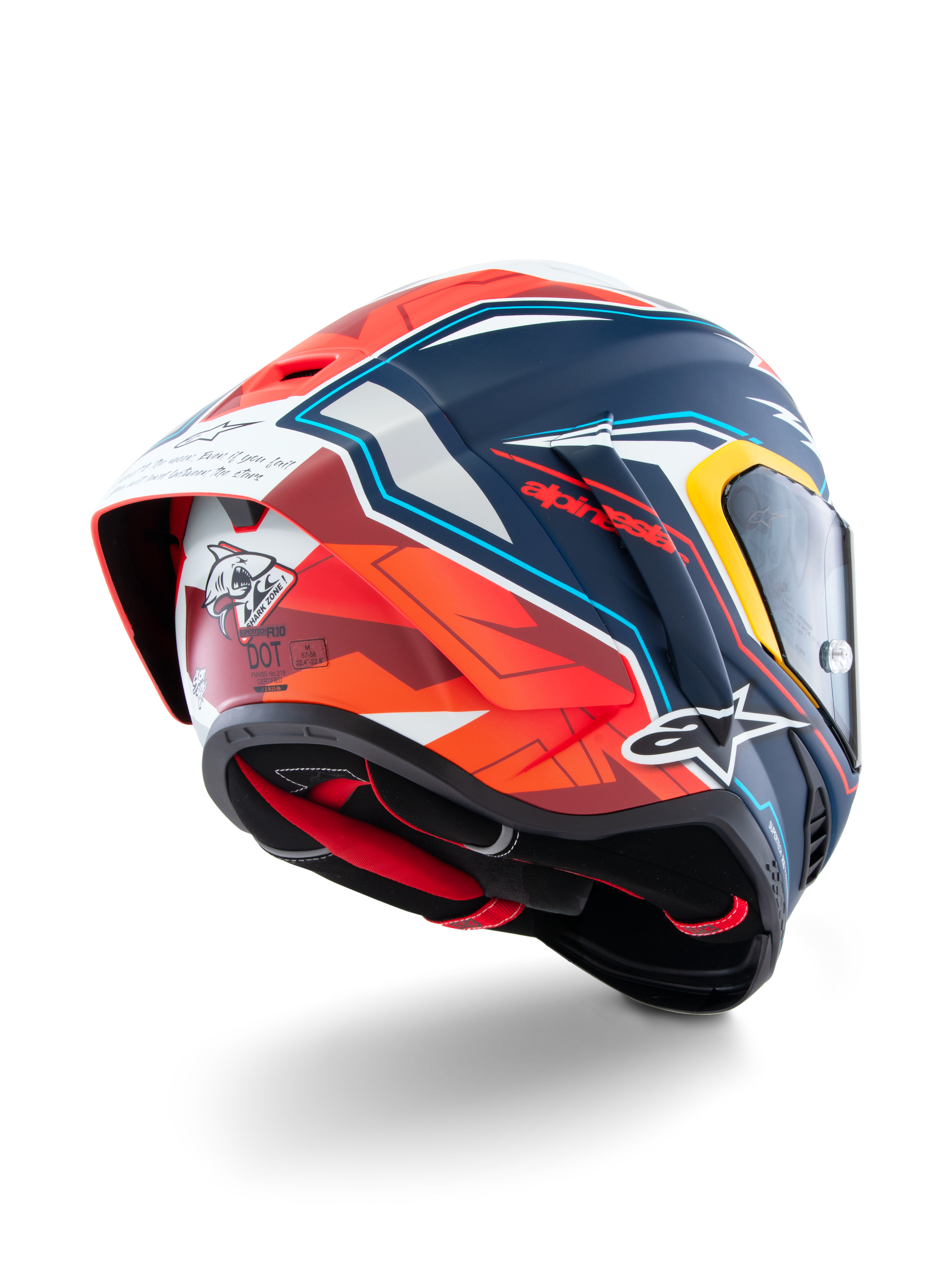 Alpinestars Supertech R10 Acosta Limited Edition helm, driekwart achteraanzicht, blauw, rood en witte matte afwerking, met aerodynamische spoiler, haai-graphic op de achterkant, Alpinestars-logo's en DOT-certificering, hoogwaardige race-motorhelm