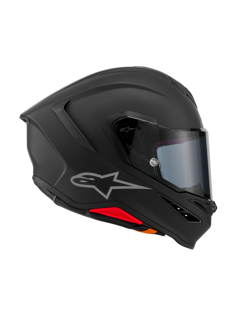 Alpinestars S-R7 Solid Helmet, Full-Face motorcycle helmet, Matte Black, side profile view showing aerodynamic carbon composite shell, integrated rear spoiler, silver Astars logo, clear visor, and ventilation ports, racing and sport riding gear