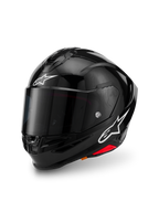 Alpinestars S-R7 Solid Helmet, Black Glossy, full-face motorcycle helmet with carbon composite shell, white star logos on forehead and side, aerodynamic design with integrated spoiler and ventilation ports