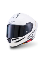 Alpinestars S-R7 Solid Helmet, Full-face Motorcycle Helmet, White Glossy, dark smoke visor, black star logo on forehead and side, aerodynamic shell with ventilation ports and red accents, high-performance racing and road gear