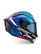 Alpinestars S-R7 Zeal helm, integraal motorracinghelm, zwart, blauw, fluorroze en wit, carbon composietconstructie, CE 22.06-gecertificeerd, zijaanzicht met aerodynamische schaal en vizier