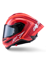 Alpinestars Supertech R10 Arius helm, integrale racehelm, glanzend rood met witte logo-graphics, zijprofiel met nadruk op de aerodynamische spoiler en helder vizier, schaal van koolstofvezelcomposiet voor professionele motorsport