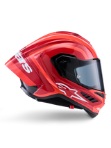Alpinestars Supertech R10 Arius Helm, integraal racehelm, glanzend rood en oranje, zijprofiel met aerodynamische achterspoiler, wit Astars-logo op de kin en helder vizier, ontworpen voor topprestaties op het circuit bij hoge snelheden