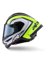 Alpinestars Supertech R10 Arius helm, motorracehelm, zwart, zilver en fluoriserend geel glanzend, zijaanzicht, voorzien van aerodynamische achterspoiler, carbonfiber constructie, opvallende logo's en getint vizier.