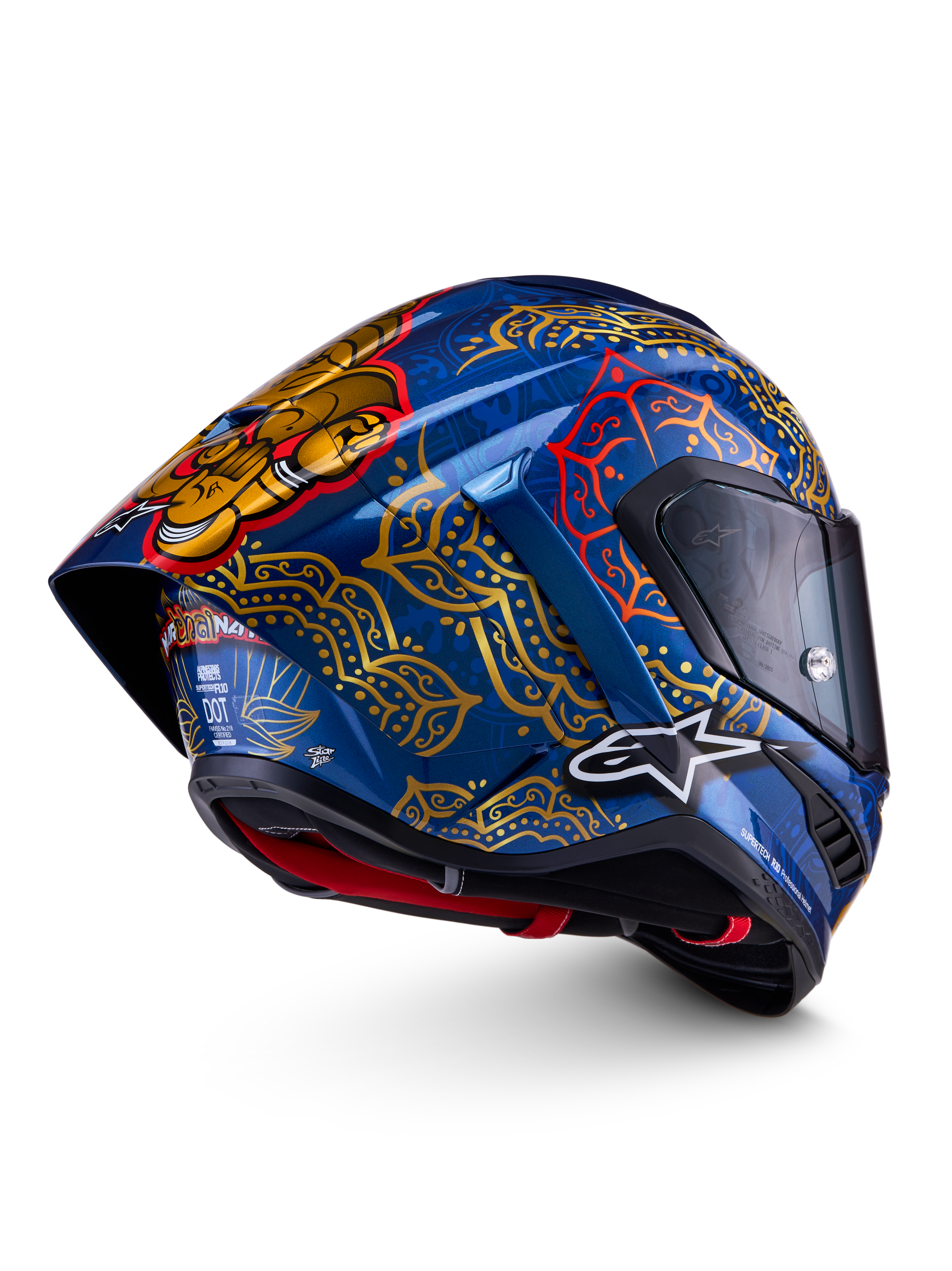 Alpinestars Supertech R10 Martinator Thai-helm in glanzend blauw met gouden mandala-patronen en aerodynamische spoiler.