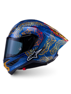 Supertech R10 Martinator Thai-helm in glanzend blauw met gouden en rode mandala-graphics en een carbon schaal.