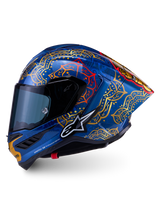 Supertech R10 Martinator Thai-helm in glanzend blauw met gouden en rode mandala-graphics en een carbon schaal.