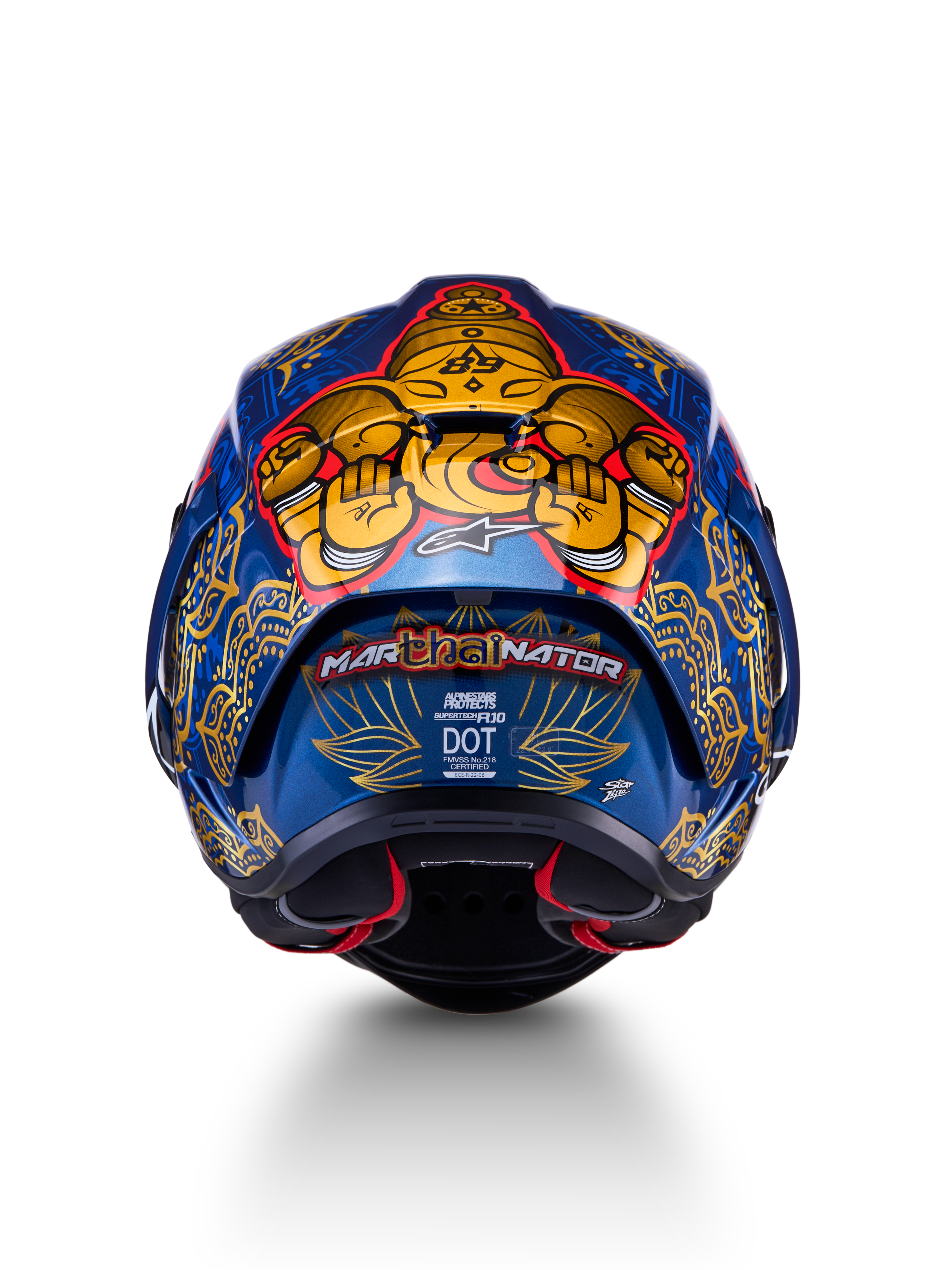 Supertech R10 Martinator Thai-helm, achteraanzicht van de blauwe carbon schaal met gouden Thaise graphics.