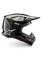 Alpinestars Supertech M10 Solid motocross helmet, side profile in black glossy carbon with carbon shell, peak visor and ventilation ports for off-road riding