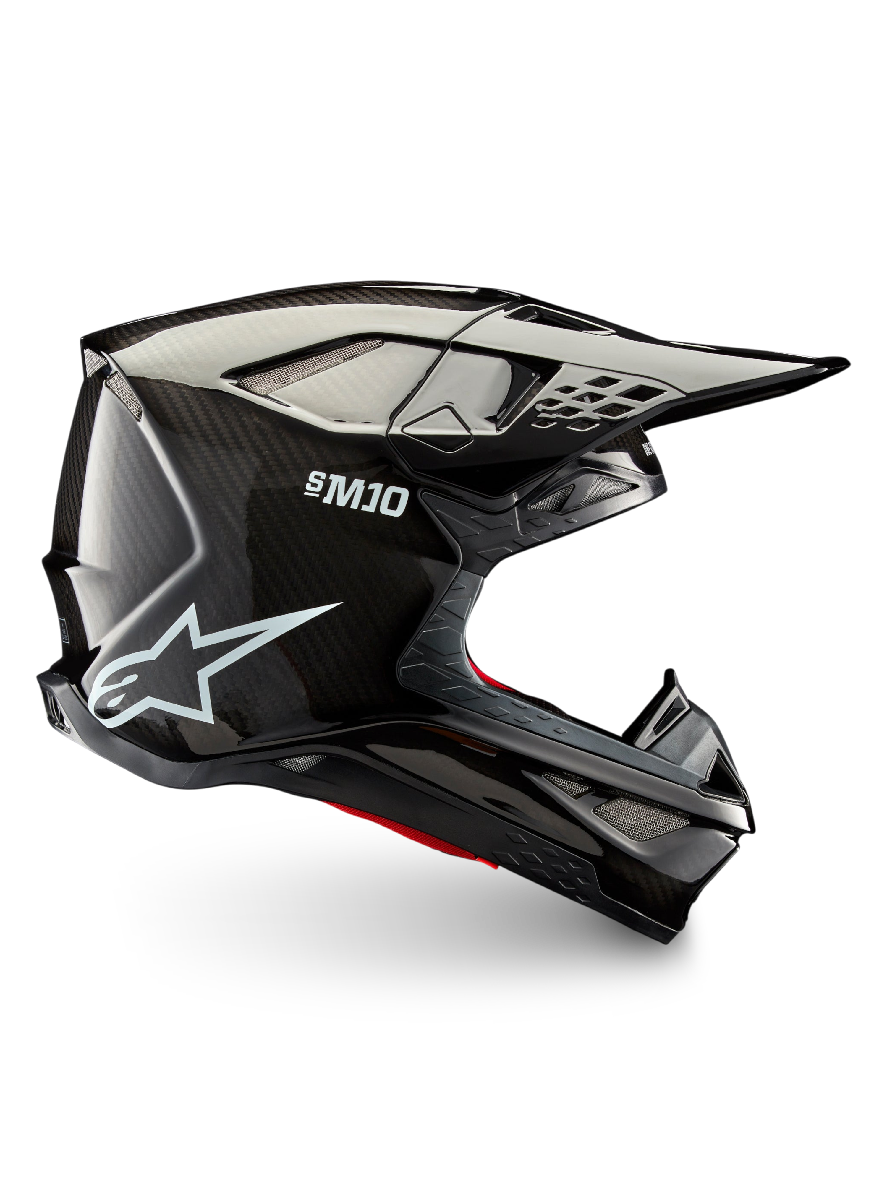 Alpinestars Supertech M10 Solid motocrosshelm, zijaanzicht, zwart glanzend carbon, carbonvezelschaal, peakvizier en ventilatiepoorten voor off-road rijden