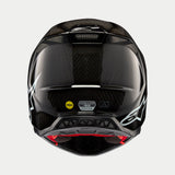 Alpinestars Supertech M10 Solid Helmet, Black Glossy Carbon, rear view showing glossy carbon fiber weave, white Alpinestars logo, MIPS and ECE certification stickers, aerodynamic shape with ventilation ports