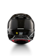 Alpinestars Supertech M10 Solid Helmet ECE 22.06, black glossy carbon motocross helmet, rear view with white graphics, ventilation ports, MIPS and ECE-R 22.06 certification labels