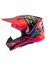 Alpinestars Supertech M10 Deegan Monster Helmet, Motocross Helmet, Orange Fluo, Pink, and Black with Blue accents, side profile view featuring Monster Energy claw and Alpinestars logo graphics, advanced aerodynamic design for off-road racing