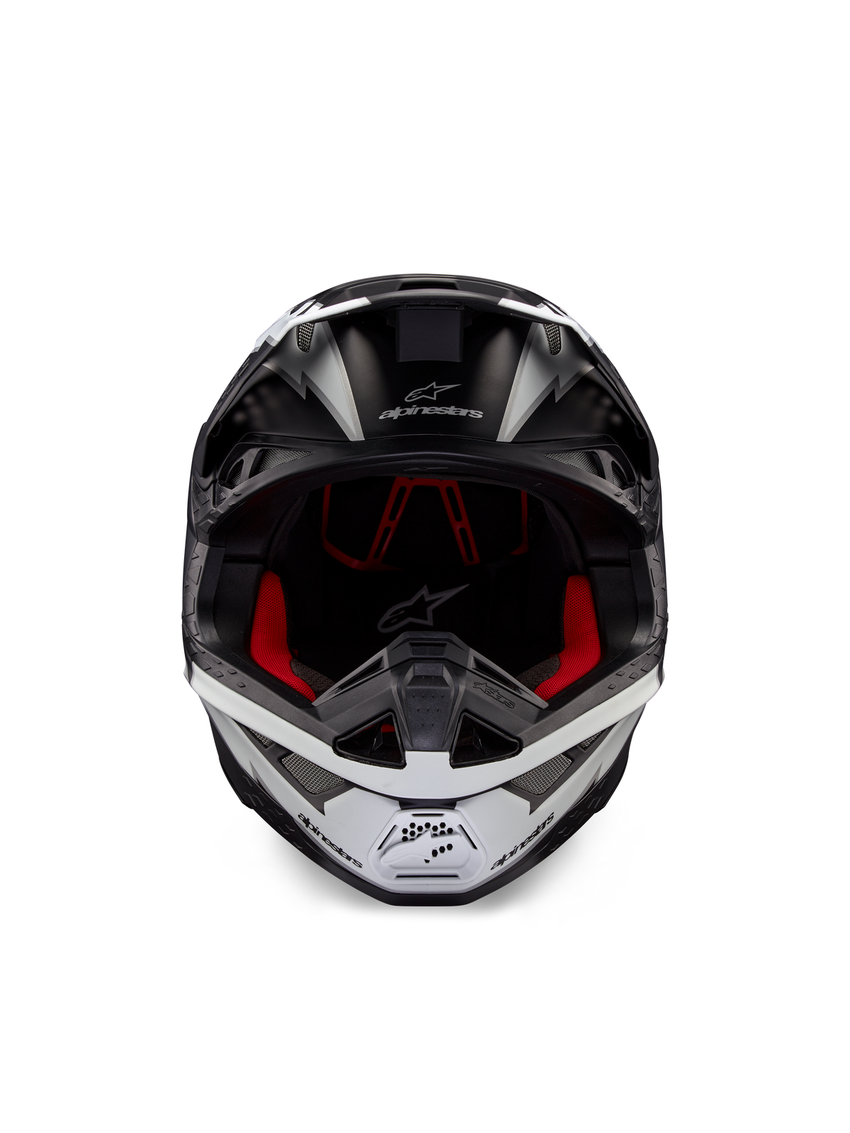 Alpinestars Supertech M10 Ampress helm, motorcrosshelm, matzwart met wit, vooraanzicht met rode binnenvoering, aerodynamische schaal met ventilatieopeningen en Alpinestars-logo