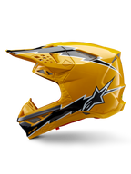 Alpinestars Supertech M10 Ampress helm, motorcrosshelm, glanzend geel met zwart-witte graphics, zijaanzicht met opvallende hoekige ontwerpen, Alpinestars sterlogo en meerdere ventilatieopeningen met zilverkleurig gaas, professionele off-road race-uitrusting