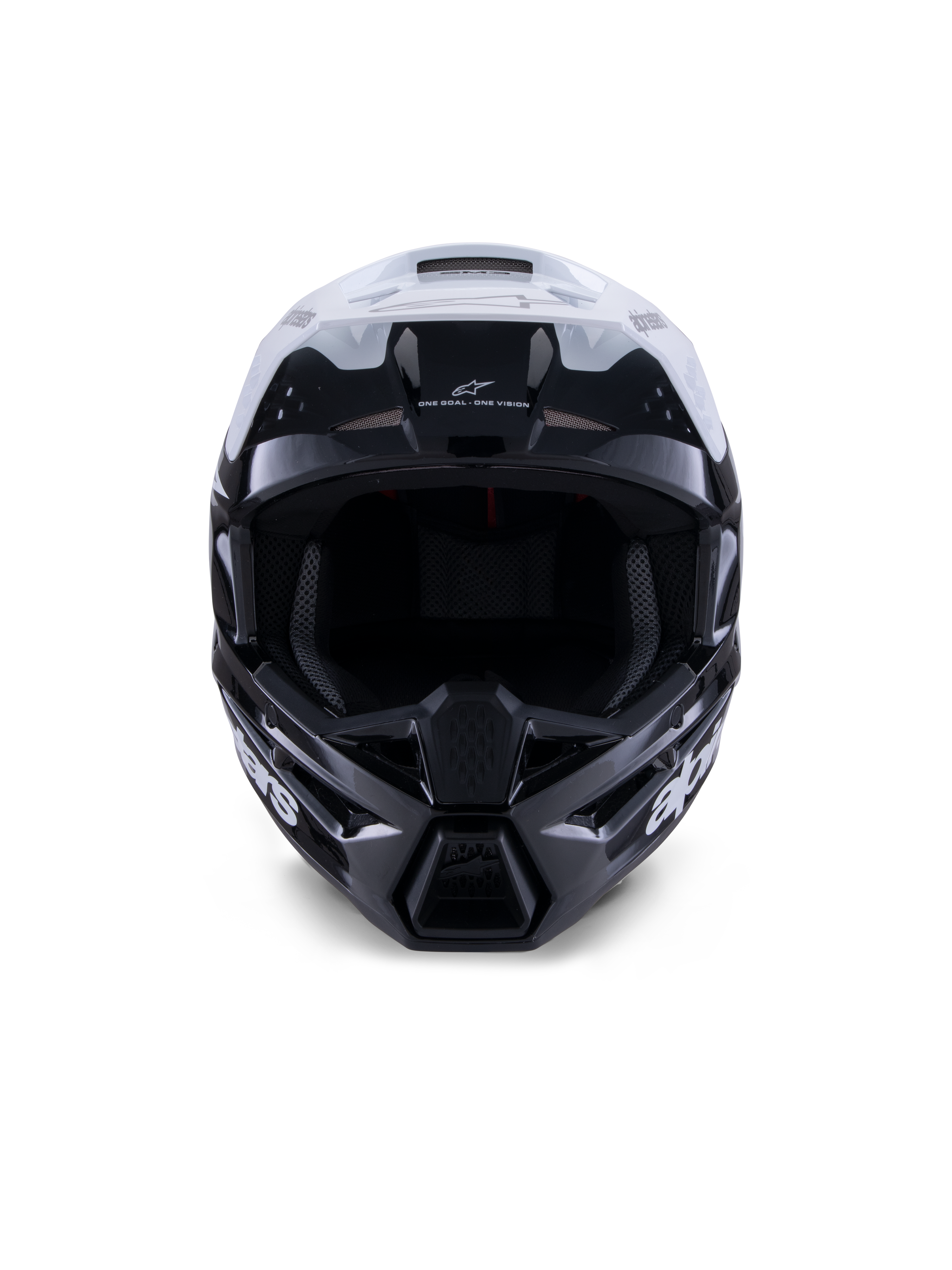 Alpinestars S-M3 Radium helm, motorcrosshelm, glanzend zwart, wit en grijs, vooraanzicht, voorzien van een agressief schaalontwerp met een wit vizier, zwarte kinbescherming en ventilatieopeningen met mesh-voering.