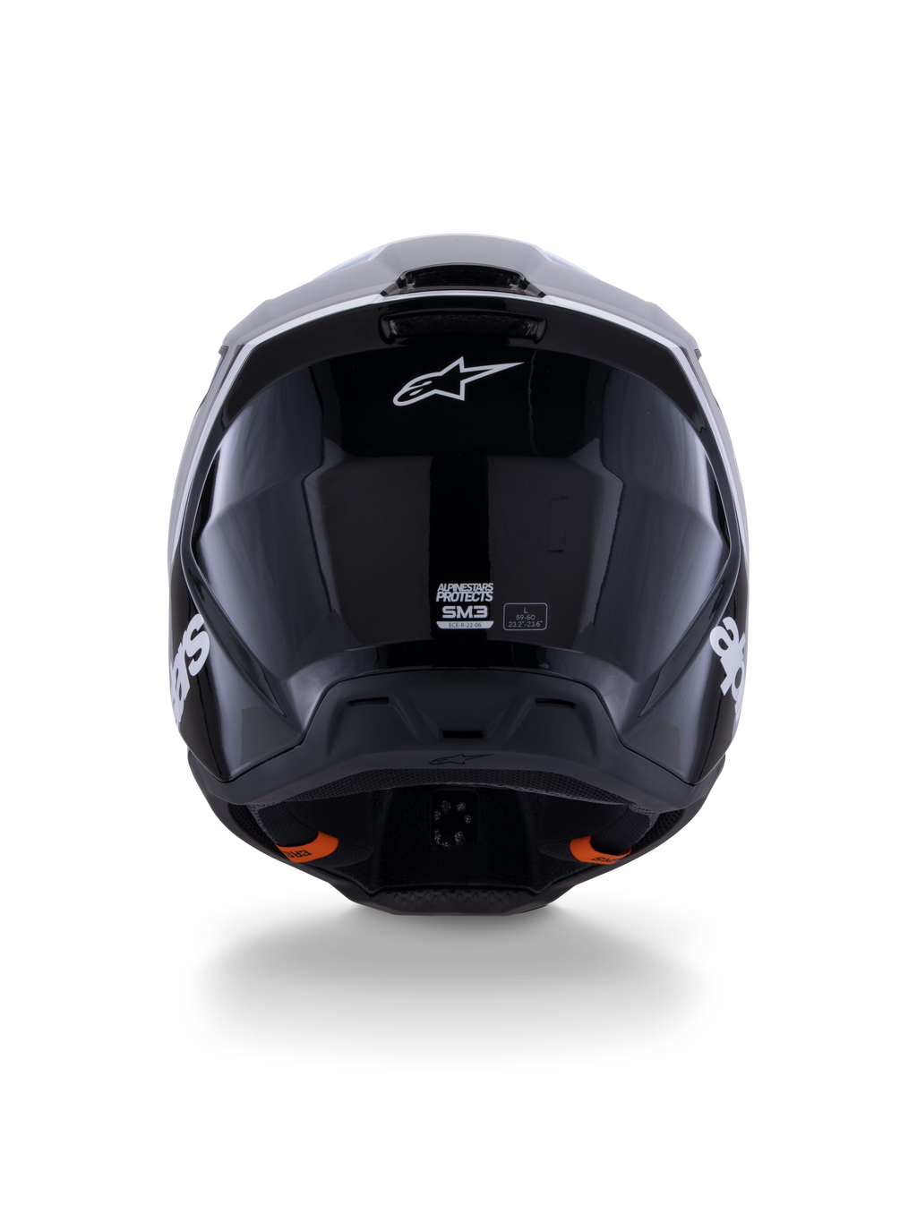 Alpinestars S-M3 Radium Helm ECE 22.06, motorcrosshelm, zwart wit grijs glanzend, achteraanzicht met glanzend zwarte afwerking, Alpinestars sterlogo, ventilatie-uitlaatopeningen en ECE-certificeringslabel.