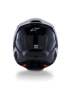 Alpinestars S-M3 Radium Helm ECE 22.06, motorcrosshelm, zwart wit grijs glanzend, achteraanzicht met glanzend zwarte afwerking, Alpinestars sterlogo, ventilatie-uitlaatopeningen en ECE-certificeringslabel.