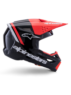 Alpinestars S-M3 Radium Helmet, Motocross Helmet, Black Red Fluo and White Glossy, featuring an aerodynamic design with an angular visor, ventilation ports, and a glossy finish, premium motorsports protection