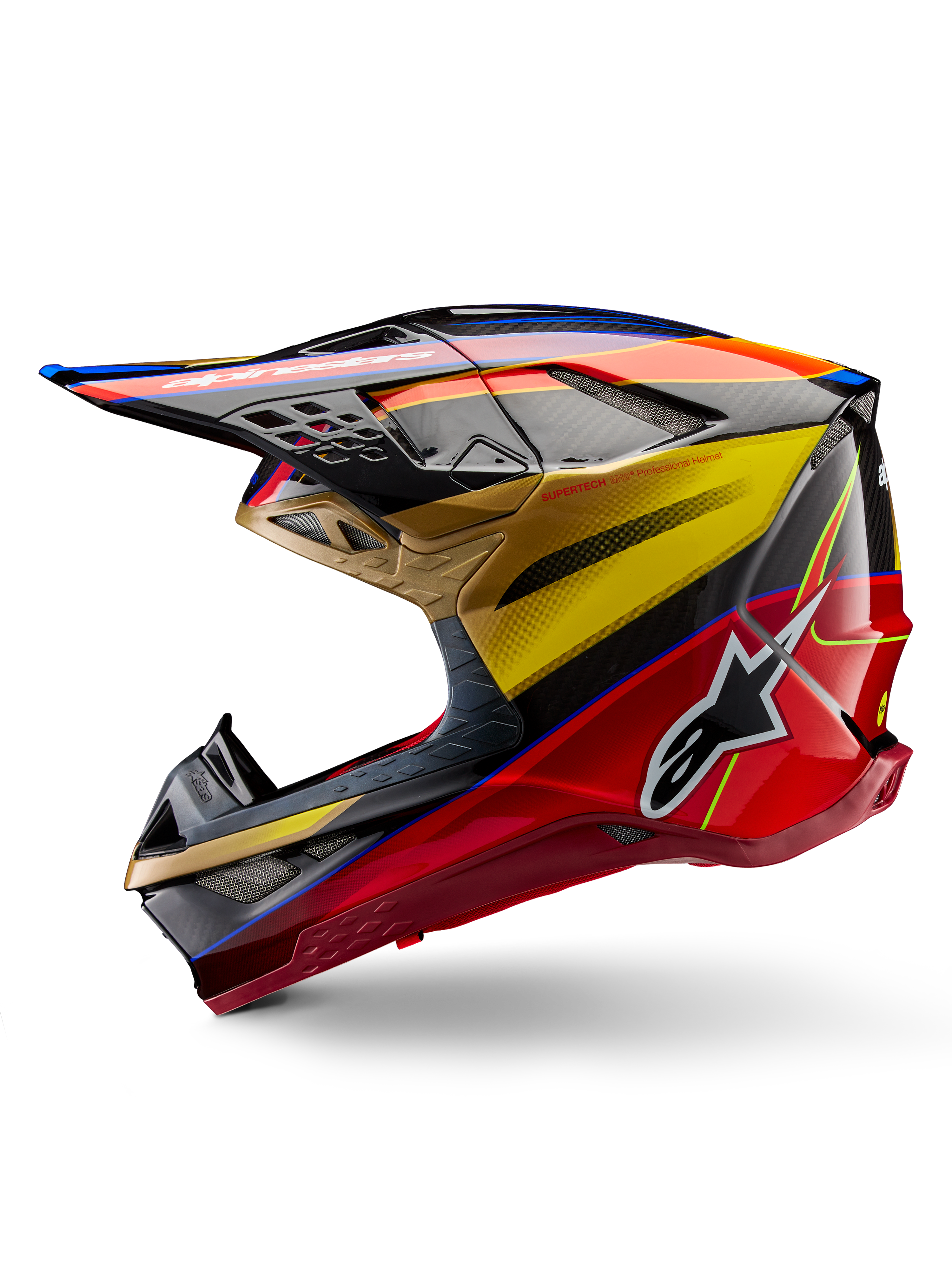 Alpinestars Supertech M10 Era helm, motorcrosshelm, Gold Yellow Rio Red Glossy, zijprofiel met carbon fiber textuur en opvallende graphics, Alpinestars-sterlogo, aerodynamische vorm met meerdere ventilatieopeningen, professionele off-road racebescherming