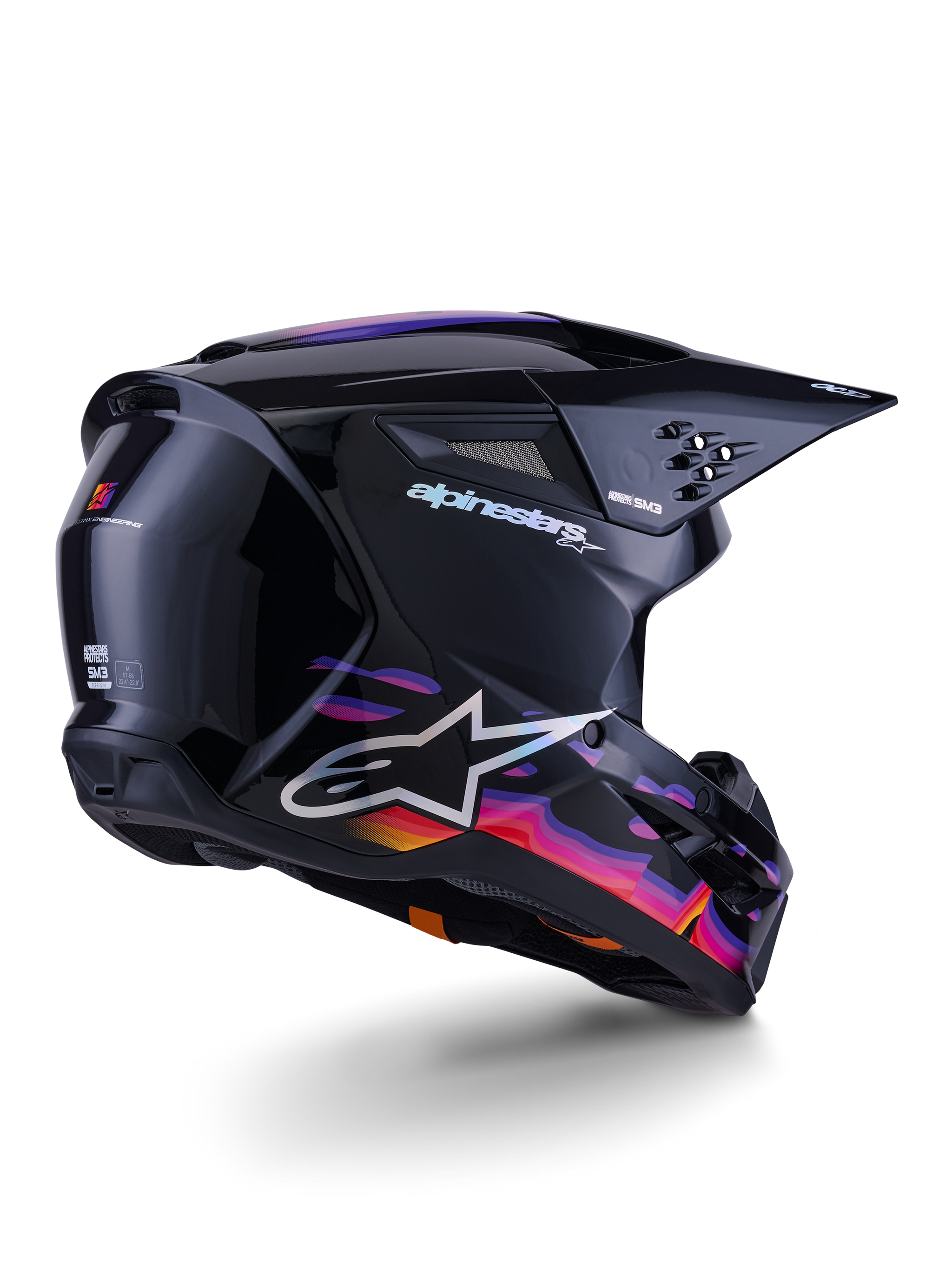 Alpinestars S-M3 Force OCD-helm, motorcrosshelm, glanzend zwart met levendige paarse, roze en oranje golvende graphics, witte Alpinestars-merknaam en A-star logo, driekwart achteraanzicht, hoogwaardige off-road race-uitrusting