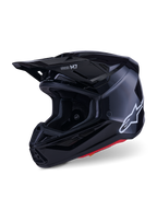 Alpinestars S-M7 Solid Helmet, Motocross Helmet, Black Glossy, featuring a white Alpinestars logo on the side, aerodynamic visor, and multiple air intake vents for off-road racing protection