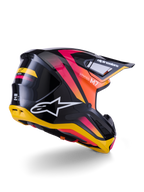 Alpinestars S-M7 Rise helm, motorcrosshelm, zwart, geel en roze glanzend, achter- en zijaanzicht met aerodynamische composietschaal, levendige kleurverlopen, opvallende logo's en ventilatieopeningen
