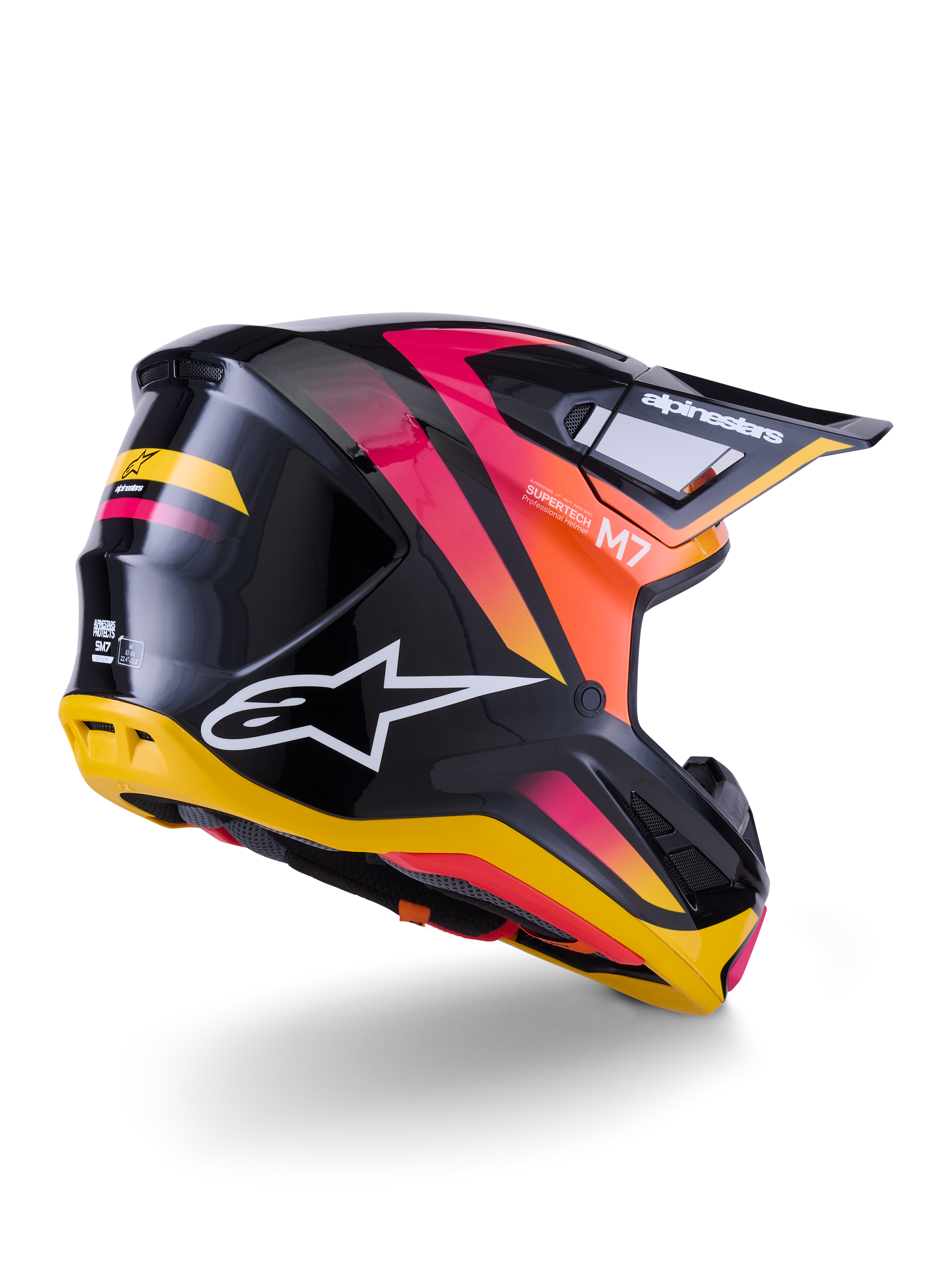 Alpinestars S-M7 Rise helm, motorcrosshelm, zwart, geel en roze glanzend, achter- en zijaanzicht met aerodynamische composietschaal, levendige kleurverlopen, opvallende logo's en ventilatieopeningen