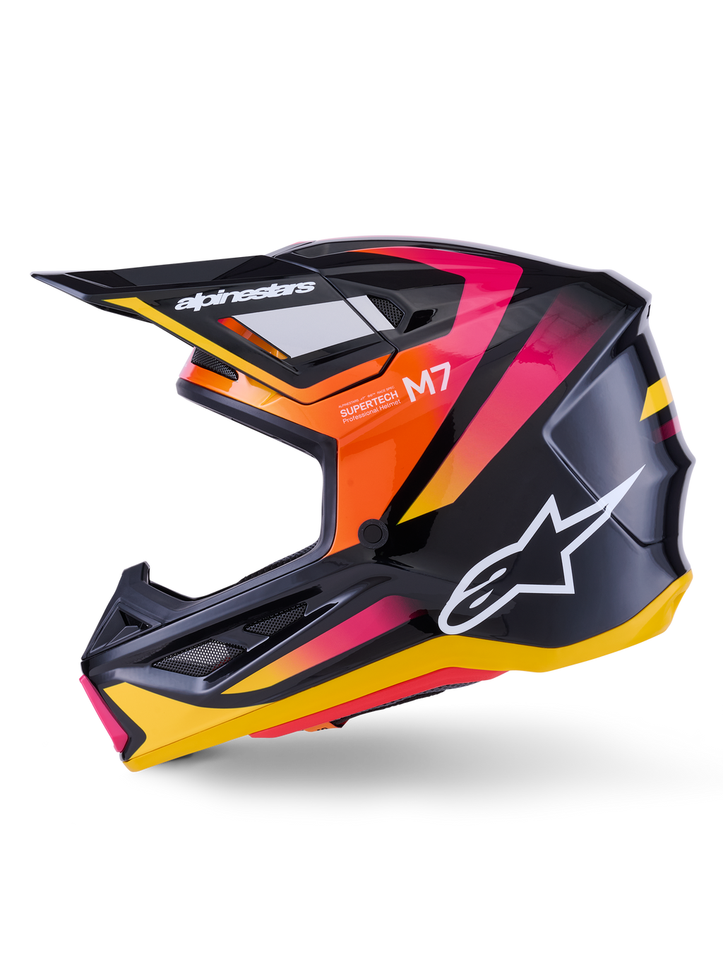 Alpinestars S-M7 Rise helm, motorcrosshelm, glanzend zwart, geel en roze, zijprofiel met levendige oranje en roze kleurverloopaccenten, wit Alpinestars-logo, strak aerodynamisch ontwerp met een zwarte klep, professionele hoofdbescherming voor off-road racen