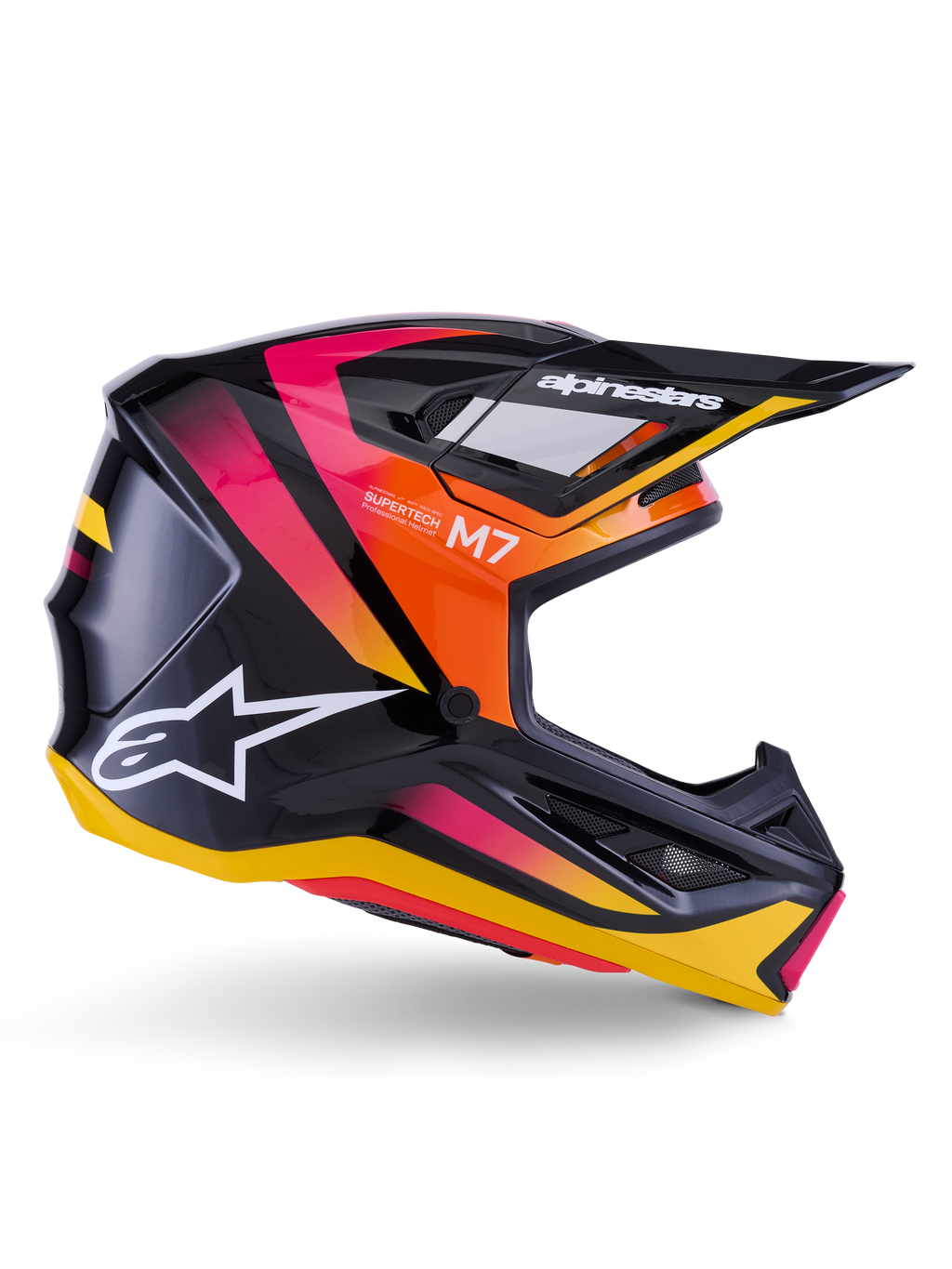 Alpinestars S-M7 Rise helm, motorcross racing helm, glanzend zwart met roze, oranje en gele graphics, zijaanzicht, voorzien van wit Alpinestars-logo en klep, aerodynamische schaal met geïntegreerde ventilatieopeningen