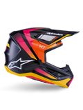 Alpinestars S-M7 Rise helm, motorcross racing helm, glanzend zwart met roze, oranje en gele graphics, zijaanzicht, voorzien van wit Alpinestars-logo en klep, aerodynamische schaal met geïntegreerde ventilatieopeningen