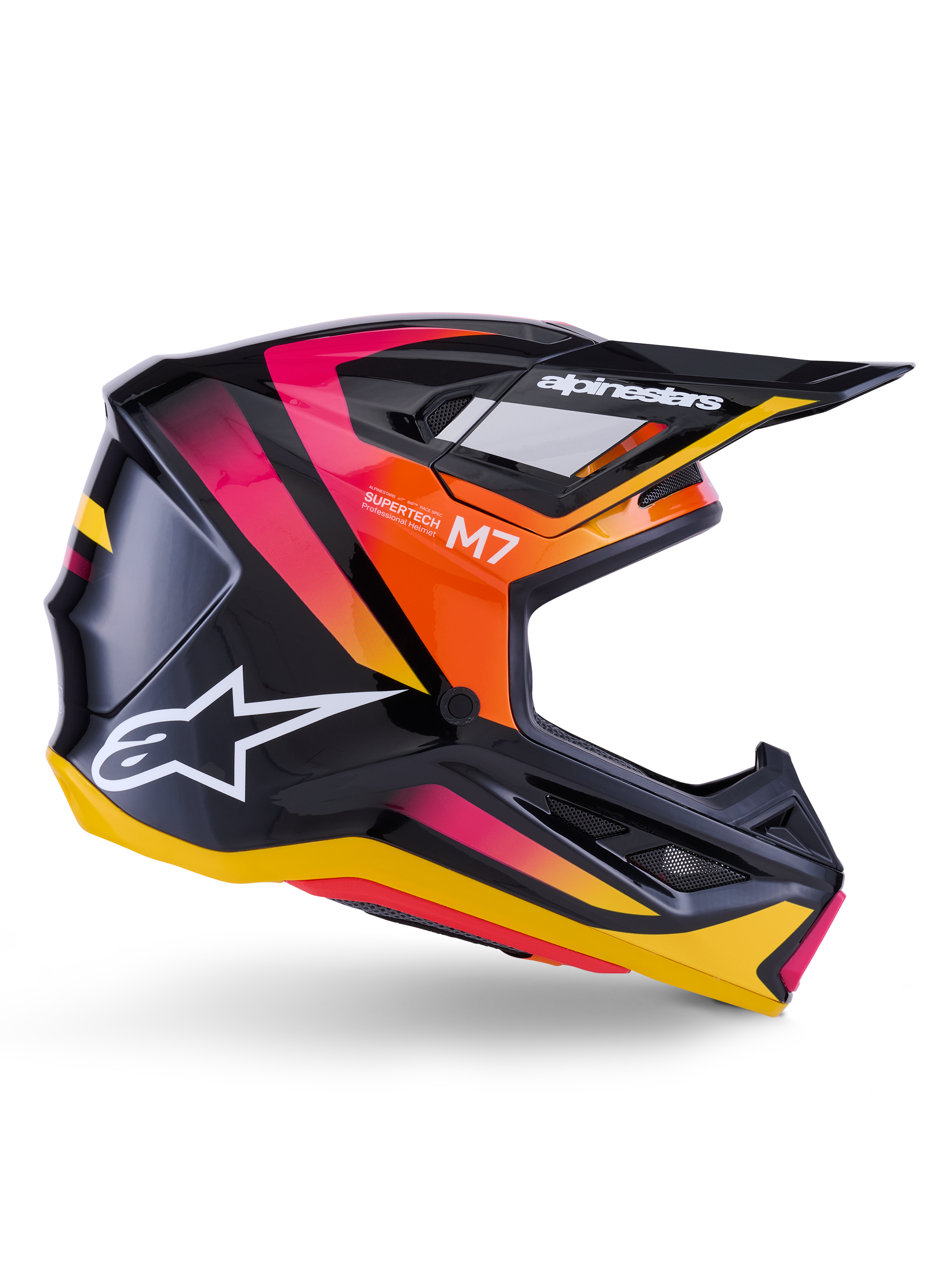 Alpinestars S-M7 Rise helm, motorcross racing helm, glanzend zwart met roze, oranje en gele graphics, zijaanzicht, voorzien van wit Alpinestars-logo en klep, aerodynamische schaal met geïntegreerde ventilatieopeningen