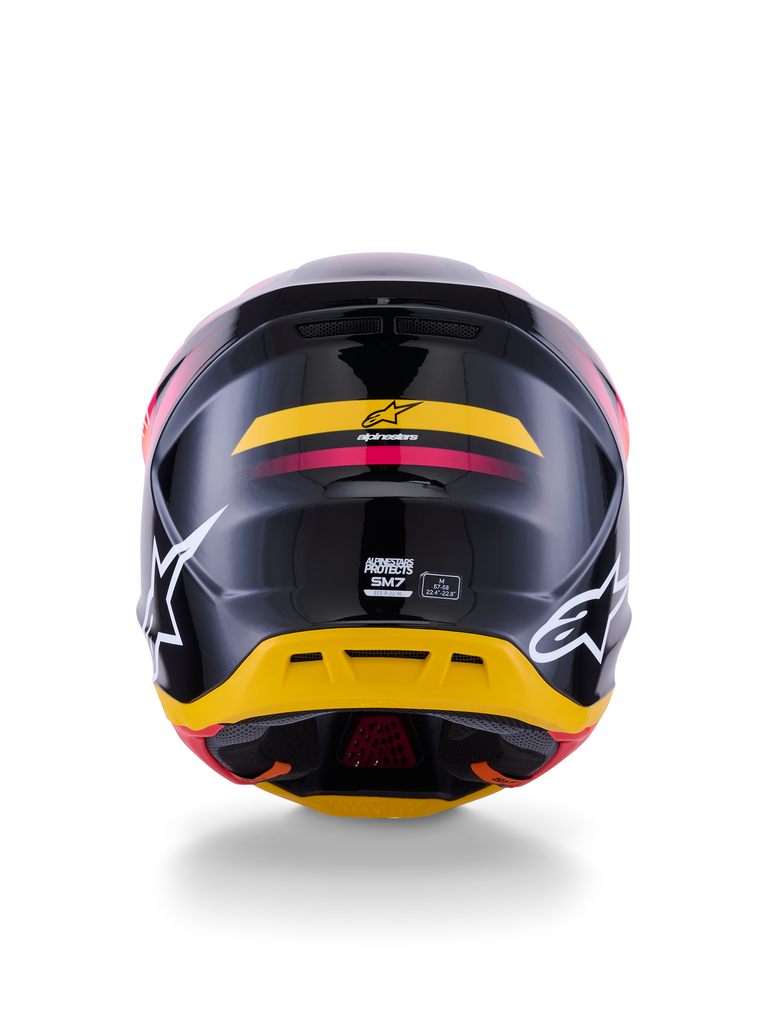 Alpinestars S-M7 Rise helm ECE 22.06, motocrosshelm, achteraanzicht, glanzend zwart met gele en roze accenten, grote witte logo's op de zijkanten, aerodynamische composietschaal, off-road race-uitrusting