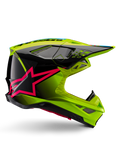 Alpinestars Supertech M10 Unite helm, motorcross racehelm, fluogeel en zwart met Diva Pink ster-graphics, glanzend aerodynamisch ontwerp met meerdere ventilatieopeningen, ECE 22.06 gecertificeerd