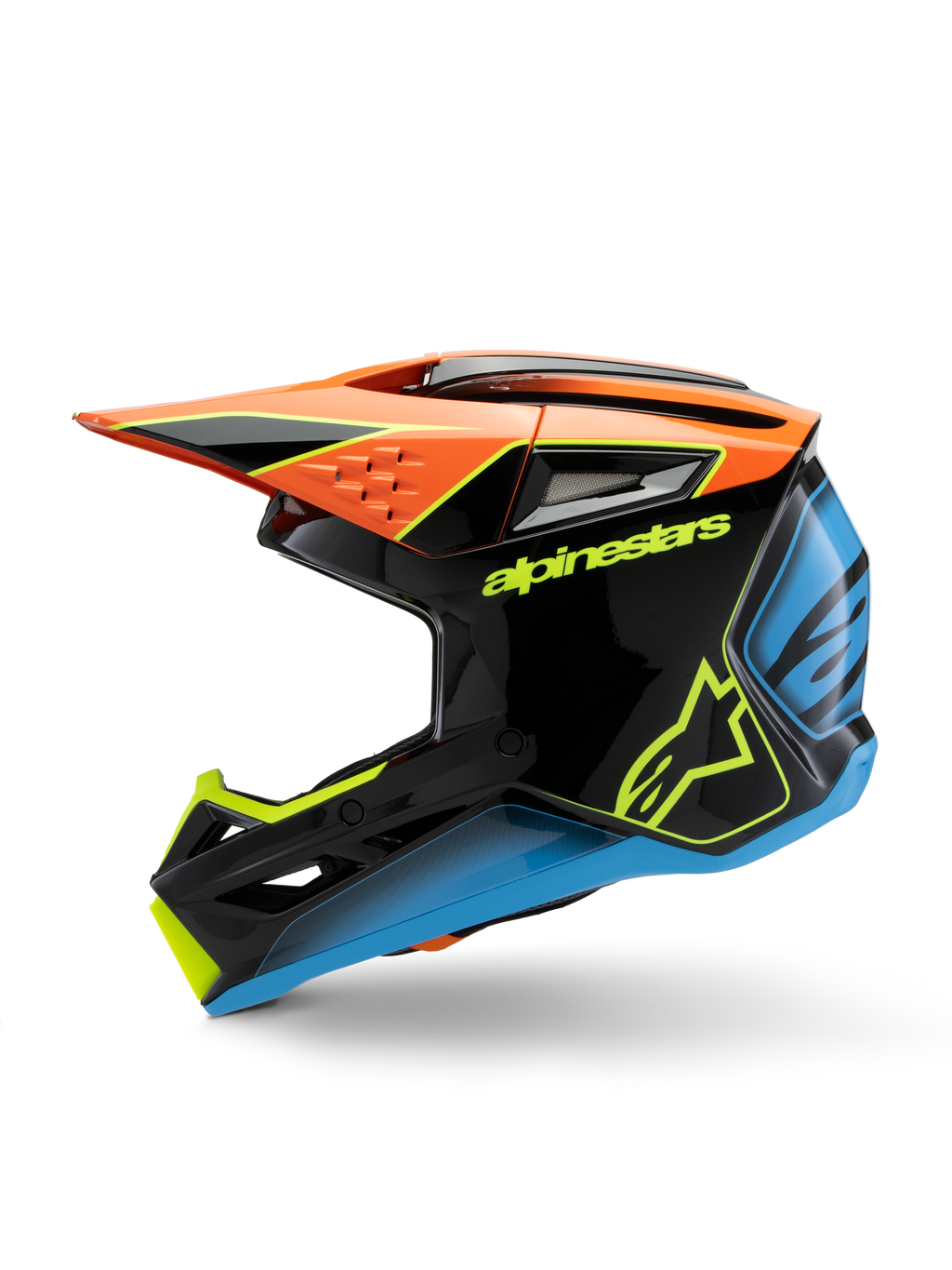 Alpinestars S-M3 Youth Fray helm, motorcrosshelm, zwart met oranje, gele en blauwe accenten, zijaanzicht, voorzien van opvallende Alpinestars-branding, agressieve styling met een groot vizier en ventilatieopeningen, hoogglans beschermende uitrusting voor jonge off-road rijders