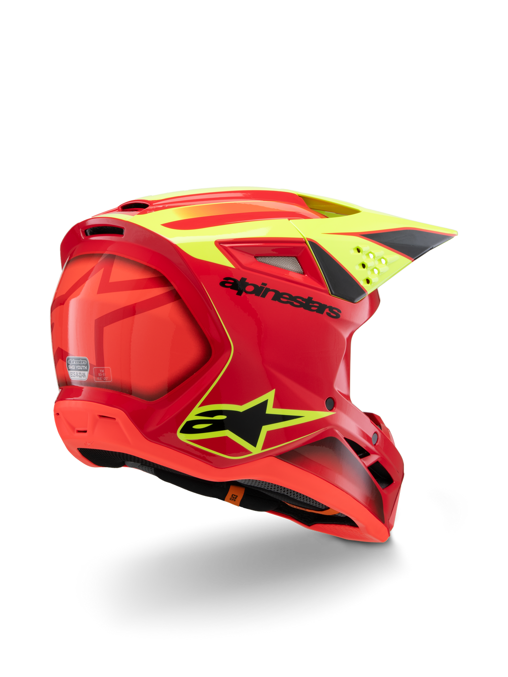 Alpinestars S-M3 Jeugd Fray Helm, rood en geel fluo glanzend, driekwart achteraanzicht, met opvallende zwarte logo's en aerodynamische ventilatieopeningen, high-visibility jeugd motocrosshelm