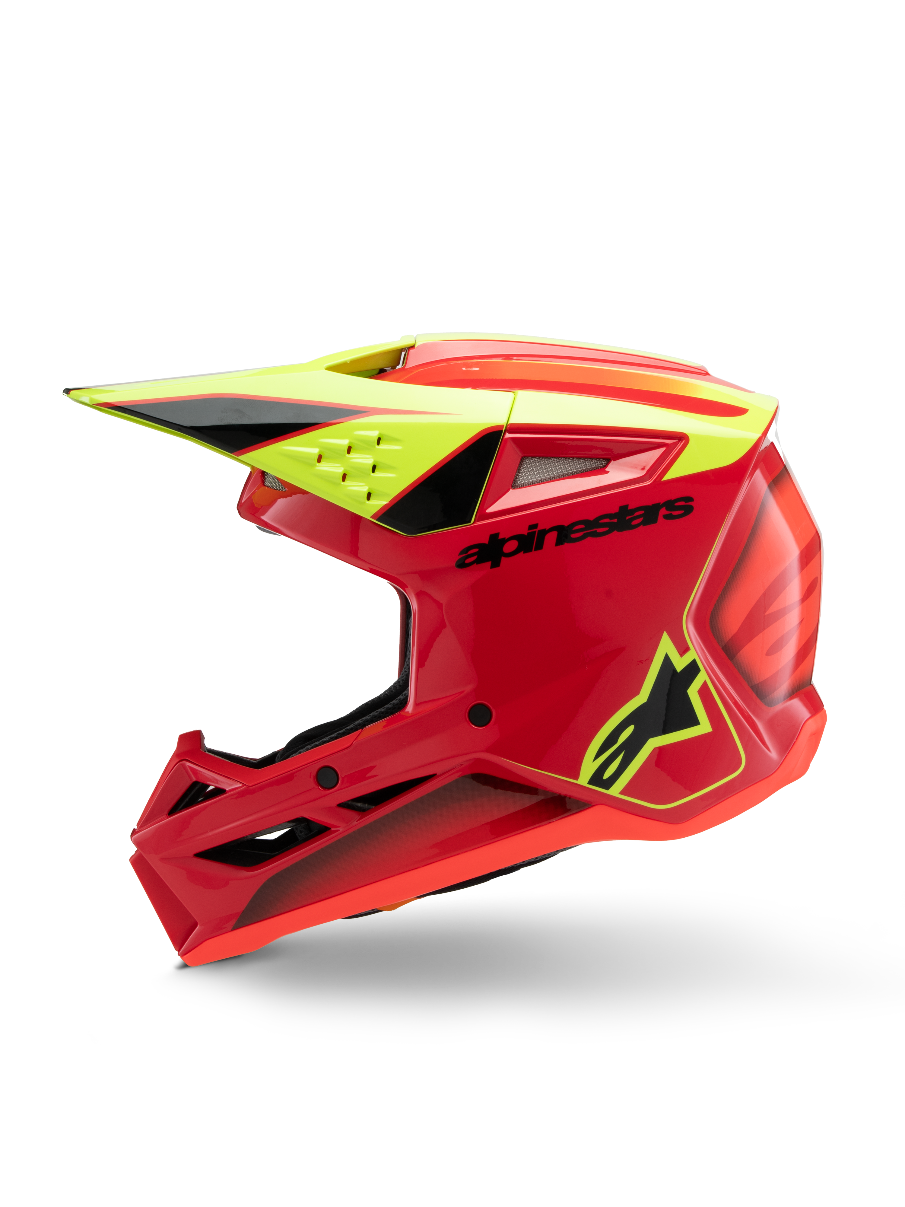 Alpinestars S-M3 Youth Fray helm, motorcrosshelm, rood, neon geel en glanzend zwart, zijaanzicht met aerodynamisch vizier, ventilatie-inlaten en opvallende branding, off-road beschermende uitrusting voor de jeugd