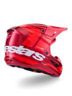 Alpinestars S-M7 Core Helmet, Motocross Helmet, Red Glossy with large white Alpinestars logo on the side, featuring an aerodynamic shell, integrated ventilation ports, and protective visor, 3/4 rear view